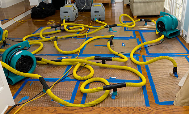 Professional Storm Water Damage Restoration technician working in Preston, OK